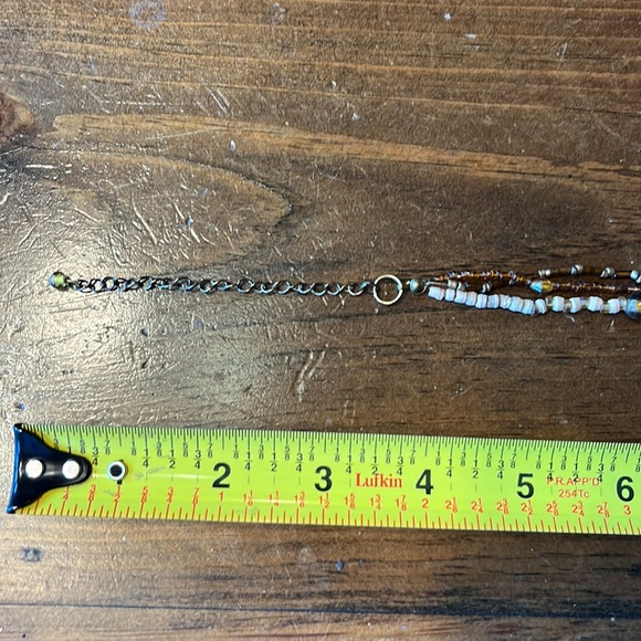 Brown beaded necklace. Worn several times. Listing #7022 - Picture 7 of 11
